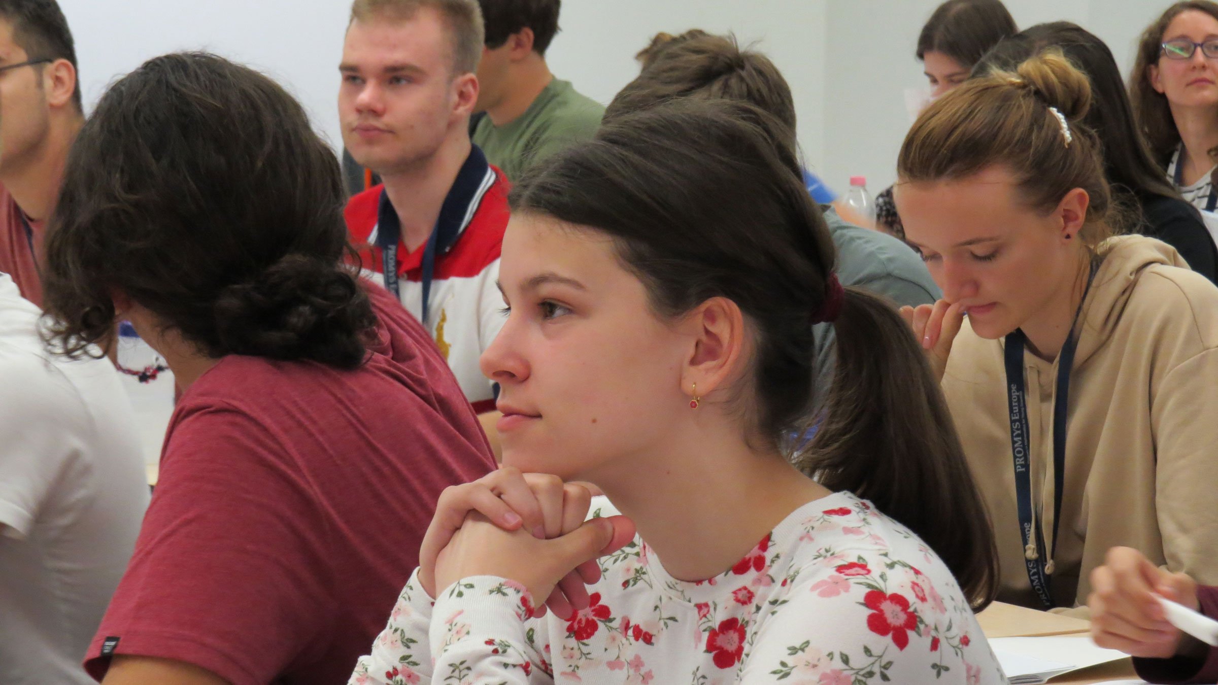 Female student listening to a PROMYS lecture